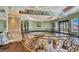 Ornate foyer with hardwood floors, decorative ceilings, and wrought iron railings at 2200 Glenbrook Way, Las Vegas, NV 89117