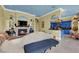 Open concept living room with a fireplace, and access to the adjacent kitchen at 2200 Glenbrook Way, Las Vegas, NV 89117