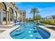 Inviting pool and spa with bar stools, surrounded by well-manicured landscaping at 2200 Glenbrook Way, Las Vegas, NV 89117