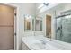 Bathroom includes modern vanity and glass shower with marble tile at 2229 Bowstring Dr, Las Vegas, NV 89142