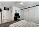 This bedroom boasts plenty of closet space, a ceiling fan, and features an entrance to the hallway at 2496 Ram Crossing Way, Henderson, NV 89074