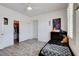 Bedroom with a ceiling fan, closet, and an adjacent room at 2496 Ram Crossing Way, Henderson, NV 89074