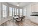 Dining area offers views from multiple windows and is adjacent to the kitchen at 2496 Ram Crossing Way, Henderson, NV 89074