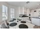 Dining area connects to the kitchen and is filled with natural light from the windows at 2496 Ram Crossing Way, Henderson, NV 89074