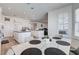 The dining area is next to the kitchen and has views of the living room at 2496 Ram Crossing Way, Henderson, NV 89074