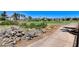 Landscaped backyard with golf course views at 2496 Ram Crossing Way, Henderson, NV 89074