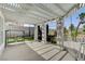 Covered patio with pergola, columns, and shade, with a swing and views of the backyard at 2496 Ram Crossing Way, Henderson, NV 89074