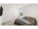 Cozy bedroom features neutral tones, soft carpet, and a comfortable queen-sized bed at 2833 Sangro Ct, Henderson, NV 89044