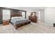 Spacious primary bedroom with neutral tones and coordinated furniture at 2833 Sangro Ct, Henderson, NV 89044