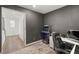 Well-lit office space includes a gaming machine, carpet, and ample desk room at 2833 Sangro Ct, Henderson, NV 89044