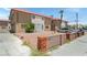 Well-maintained exterior of a two-story building with manicured landscaping at 2915 Cedar Ave # 11C, Las Vegas, NV 89101