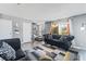 Cozy living room with comfortable seating, stylish curtains, and neutral wall paint at 2915 Cedar Ave # 11C, Las Vegas, NV 89101