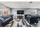 Inviting living room with two comfortable sofas, a large flatscreen TV, and a modern, stylish rug at 2915 Cedar Ave # 11C, Las Vegas, NV 89101
