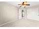 Bedroom features plush carpeting, ceiling fan with light kit, closet with sliding doors and doorway to hallway at 3524 Colby Creek Ave, North Las Vegas, NV 89081