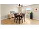 Dining room with tile flooring, ceiling fan, and a backyard view at 3524 Colby Creek Ave, North Las Vegas, NV 89081