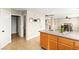 Open-concept home design, where the kitchen leads to adjacent rooms, creating a seamless living space at 3524 Colby Creek Ave, North Las Vegas, NV 89081