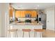 Well-equipped kitchen with stainless steel appliances, breakfast bar with seating, and ample counter space at 3524 Colby Creek Ave, North Las Vegas, NV 89081