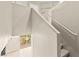 Bright staircase leading to an outdoor patio with wicker furniture at 3524 Colby Creek Ave, North Las Vegas, NV 89081