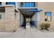 Modern building entrance with clean lines and attractive landscaping, providing a welcoming first impression at 353 E Bonneville Ave # 449, Las Vegas, NV 89101