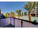 View of the pool with Palm trees from one of the units at 353 E Bonneville Ave # 449, Las Vegas, NV 89101