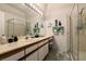 Bathroom with framed shower, large countertop with vanity, and towel rack at 3550 Bay Sands Dr # 3089, Laughlin, NV 89029