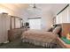 Comfortable bedroom features carpet, ceiling fan, and natural light from the sliding glass door at 3550 Bay Sands Dr # 3089, Laughlin, NV 89029