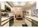 Open kitchen with stainless appliances and views of the dining area and the rest of the home at 3550 Bay Sands Dr # 3089, Laughlin, NV 89029