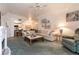 Spacious living area showcasing a comfortable layout, lighting, and kitchen access at 3550 Bay Sands Dr # 3089, Laughlin, NV 89029