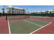 Two well-maintained tennis courts with net and fence surround for sporting activities at 3550 Bay Sands Dr # 3089, Laughlin, NV 89029