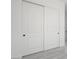 Bedroom closet with sliding white doors offers ample storage at 364 Tigullio Ave, Henderson, NV 89011
