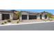 Beautiful exterior showcasing brick driveway and attached garages at 364 Tigullio Ave, Henderson, NV 89011