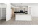 Bright kitchen with island, modern appliances, and pantry at 364 Tigullio Ave, Henderson, NV 89011