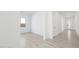 Open-concept living space featuring neutral-toned tile flooring and natural light at 364 Tigullio Ave, Henderson, NV 89011