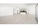Bright, expansive living area with tile flooring and modern kitchen access at 364 Tigullio Ave, Henderson, NV 89011