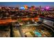 Aerial view of the property showcasing the pool, tennis courts, and surrounding area at 3930 University Center Dr # 412, Las Vegas, NV 89119