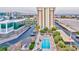 Aerial view of the property featuring the community pool and green spaces at 3930 University Center Dr # 412, Las Vegas, NV 89119