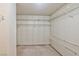 Spacious walk-in closet with carpeted floor and ample white wire shelving for organized storage at 3930 University Center Dr # 412, Las Vegas, NV 89119