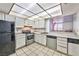 Well-lit kitchen featuring essential appliances and an open layout for convenient cooking at 3930 University Center Dr # 412, Las Vegas, NV 89119