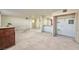 Open living room with bar counter, closet, and abundant space for flexible arrangements at 3930 University Center Dr # 412, Las Vegas, NV 89119