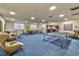Large recreation room featuring comfortable seating and a ping pong table at 3930 University Center Dr # 412, Las Vegas, NV 89119