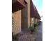 Attractive apartment building with stone accents, desert landscaping and covered walkways at 4421 Alexis Dr # 436, Las Vegas, NV 89103