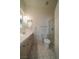 Clean bathroom with a glass-enclosed shower, neutral finishes, and a vanity at 4654 Stuttgart St, Las Vegas, NV 89147