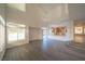 Spacious living room featuring high ceilings and an open floor plan to the kitchen at 4654 Stuttgart St, Las Vegas, NV 89147