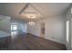 Spacious living room featuring modern gray flooring and bright natural light at 4654 Stuttgart St, Las Vegas, NV 89147