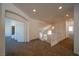 Upstairs landing with open staircase and carpeted flooring at 4654 Stuttgart St, Las Vegas, NV 89147