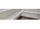 Walk-in pantry with white shelving and wood-look floors at 4828 Marco Polo St, North Las Vegas, NV 89031