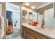 Bathroom with a bathtub/shower combination and a double sink vanity with ample counter space at 4905 Ricky Rd, Las Vegas, NV 89130
