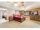 Inviting bedroom with a rustic wooden bed, matching dressers, and a cozy atmosphere at 4905 Ricky Rd, Las Vegas, NV 89130