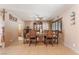 Charming dining room with wood table set and a decorative hutch at 4905 Ricky Rd, Las Vegas, NV 89130