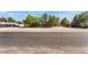 Single story home with desert landscaping and a long driveway on a sunny day at 4905 Ricky Rd, Las Vegas, NV 89130
